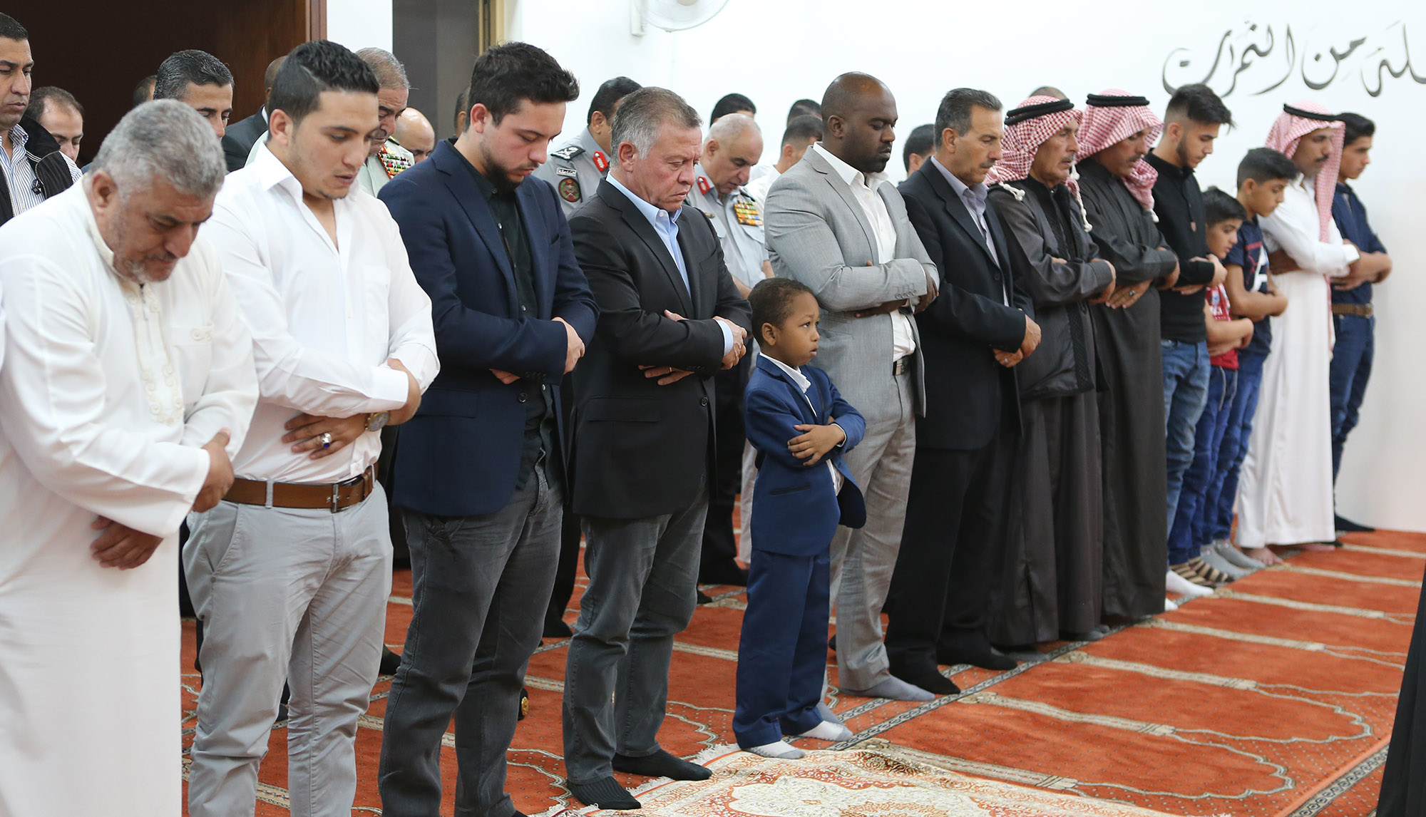 King, Crown Prince perform Eid prayer with families of Fuheis, Salt martyrs
